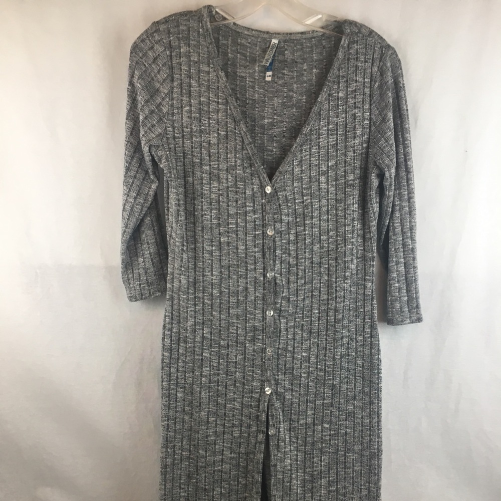 Lady’s long sweater size medium